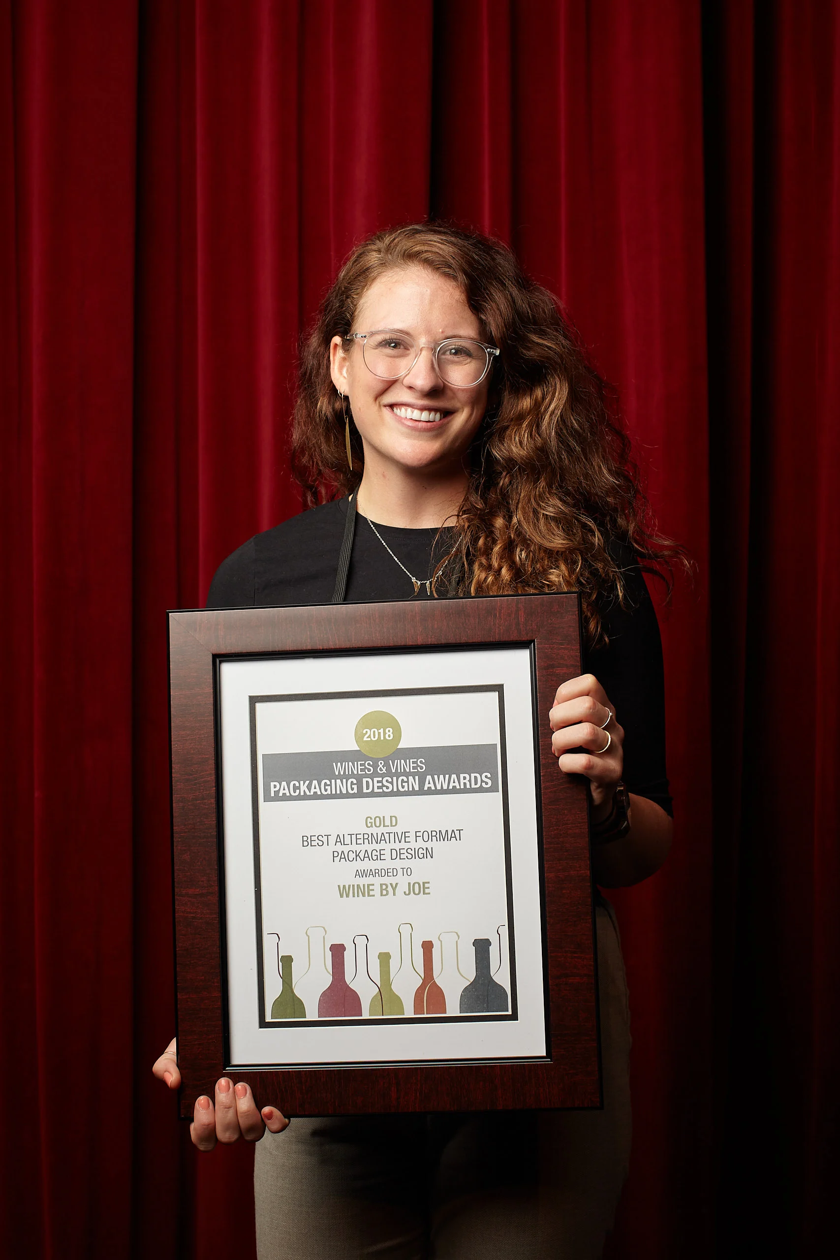 Professional institutional portrait by San Francisco photographer; featuring a gold award winner for Best Alternative Format Package Design, Napa Valley Wine Label Awards.